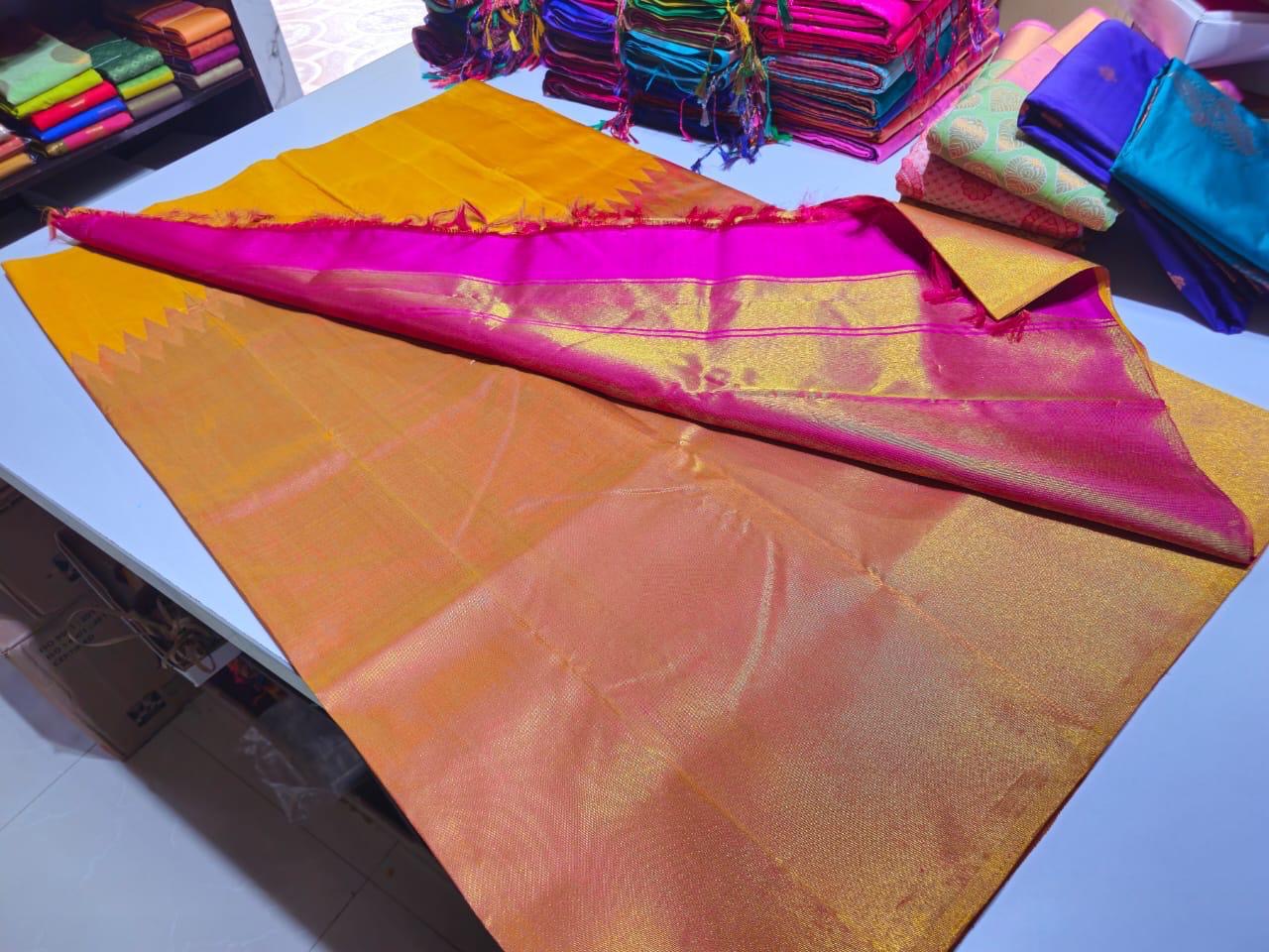 Handloom pure kanjivaram silk saree  bridal silk golden color with yellow with pink pure golden jari step over