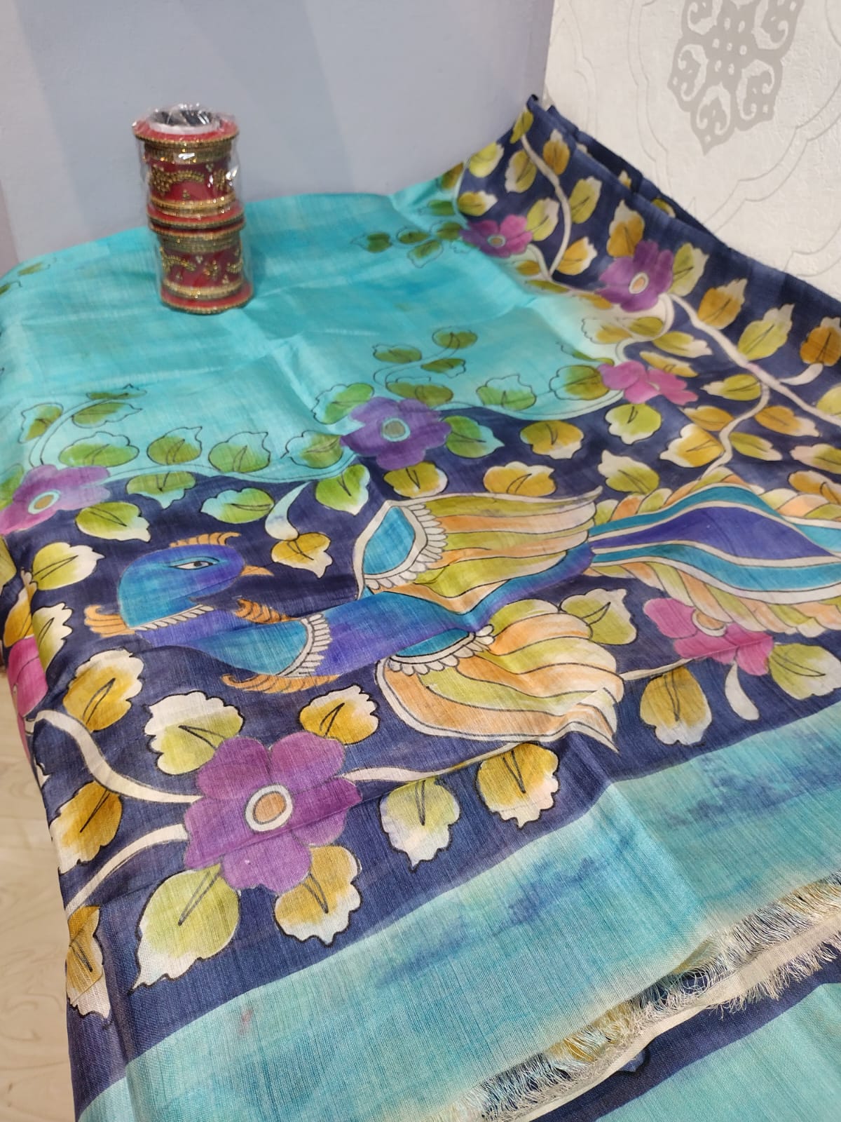 Pure Tussar dupatta in kalamkari pattern with hand painted peacock in sky blue