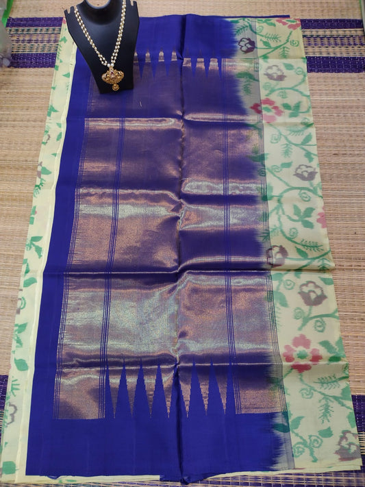 Kanjivaram softsilk saree in Ikkat cream with navy flowered pochampalli double warp with golden jari Borderless silk saree