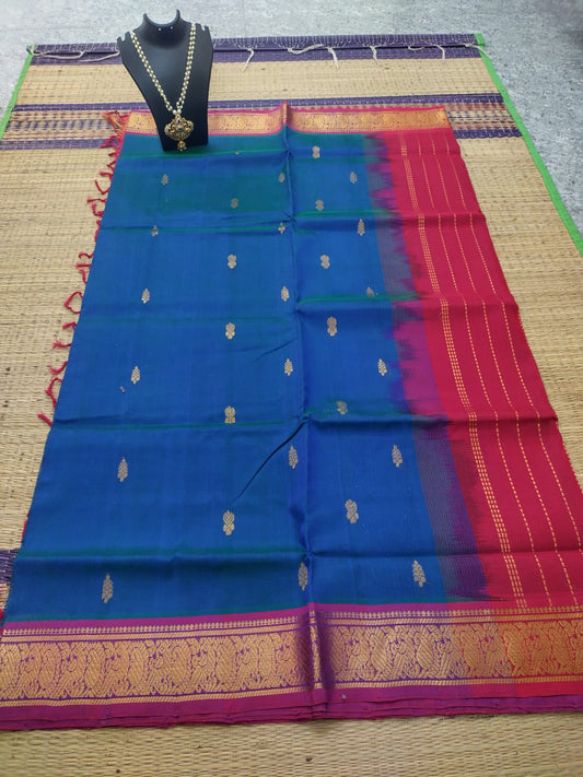 Kanjivaram silk cotton Saree blue butta saree border in red