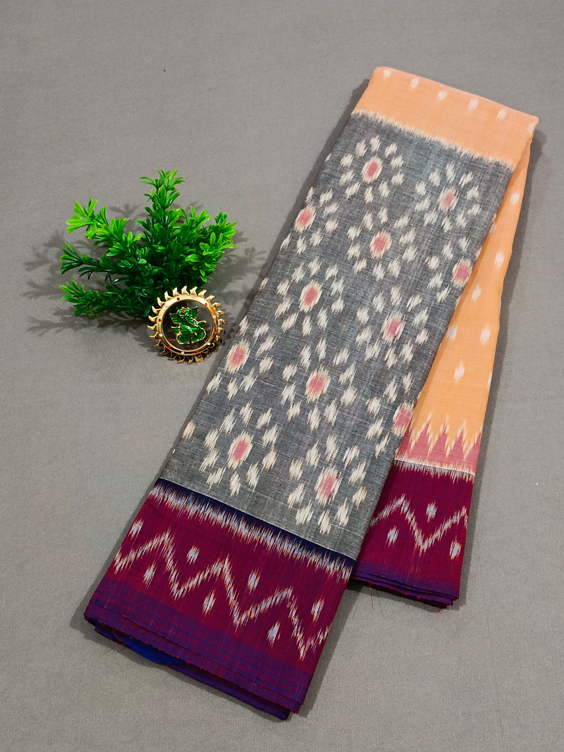 Mercerised double Ikkat pochampalli cotton saree in gray border with beige body