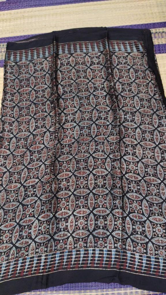 Ajrakh modal silk saree in black color flowers block printed