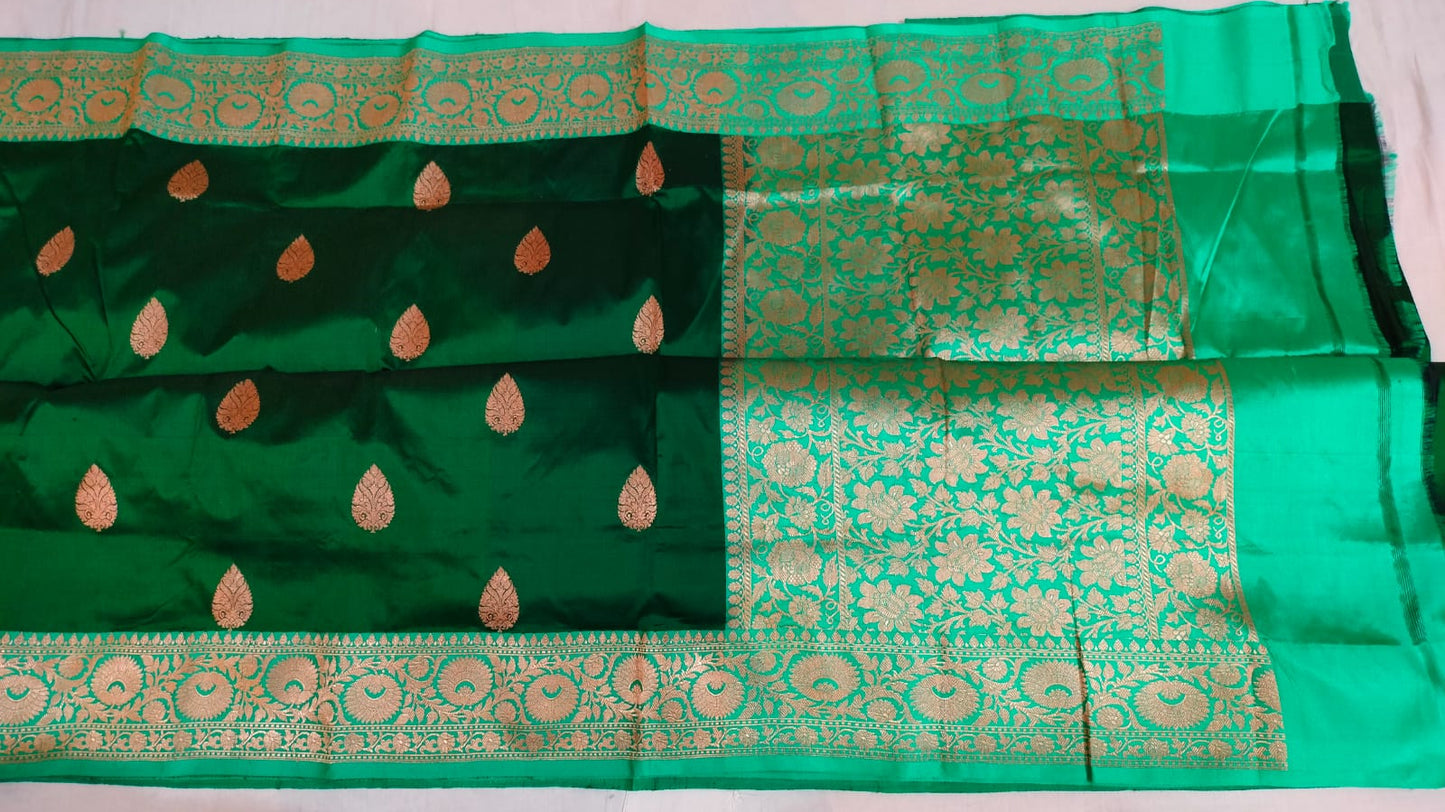 Beautiful tussar Banaras Kaduva butta saree in bottle green and light green