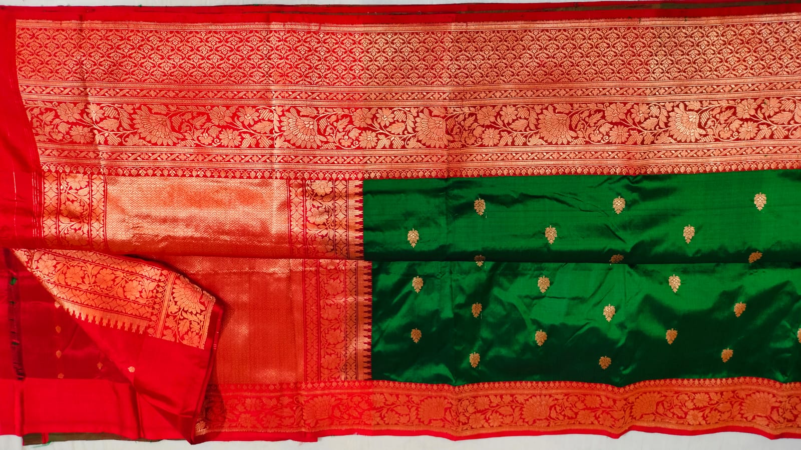 Beautiful katan Banaras Kaduva butta saree in green with red Christmas colours 