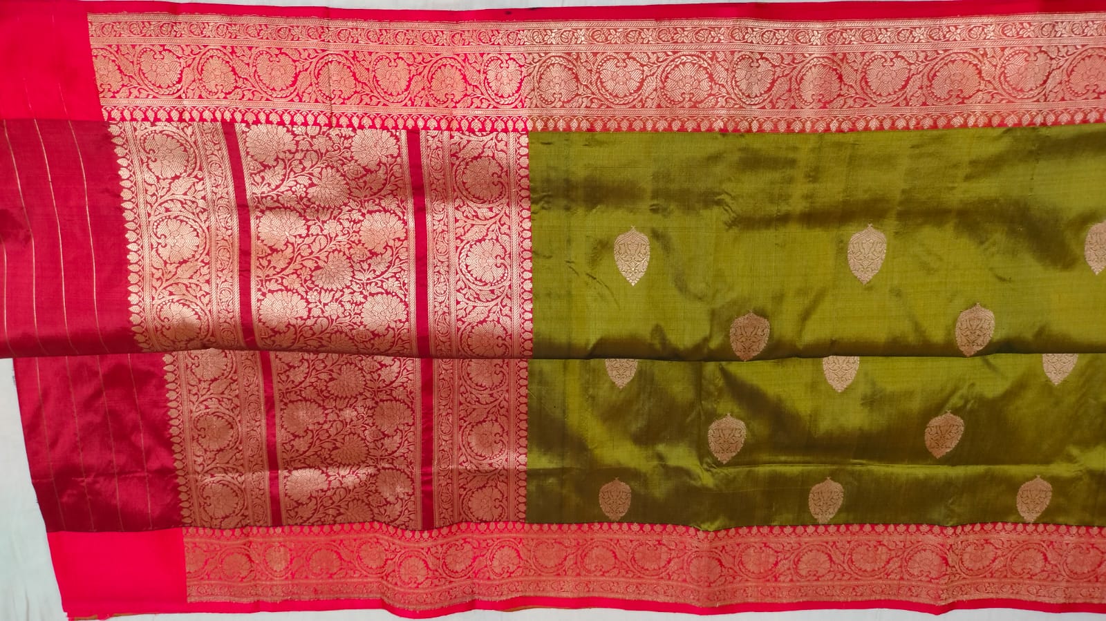 Beautiful katan Banaras Kaduva butta saree in  meganthi green with red colours