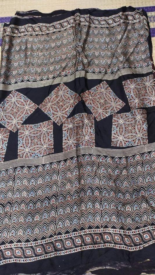 Ajrakh modal silk saree in black color big block printed