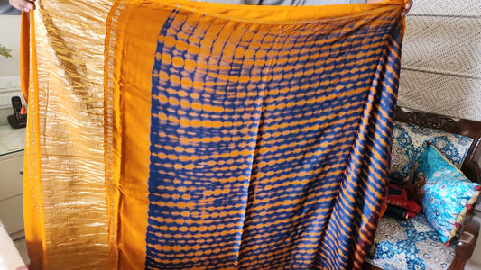 Ajrakh saree in natural dyed pure modal silk shibori oranch and navy pallu