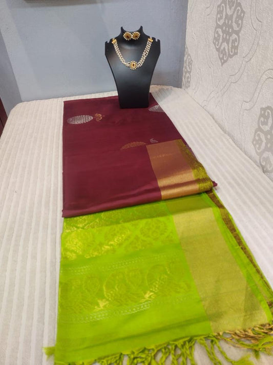 Kanjivaram softsilk saree in green with maroon double warp with silver jari