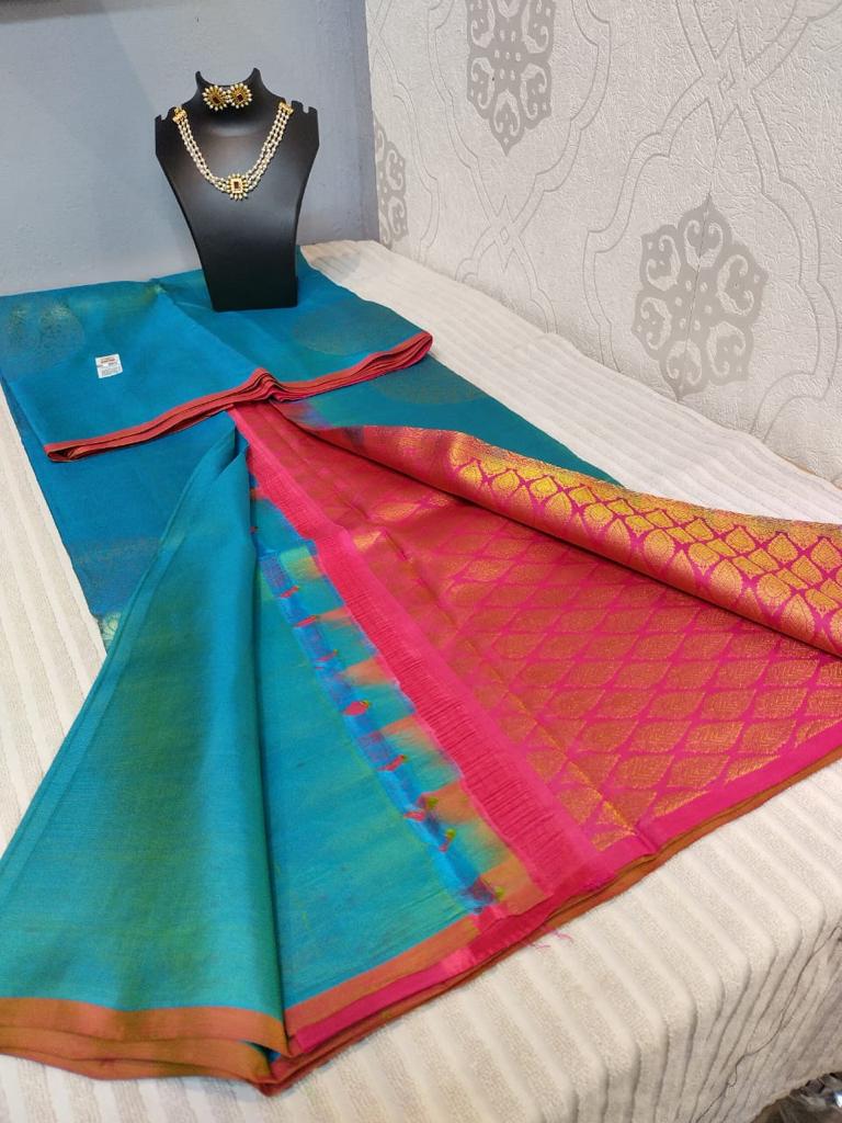 Kanjivaram saree with in peacock blue with orange border