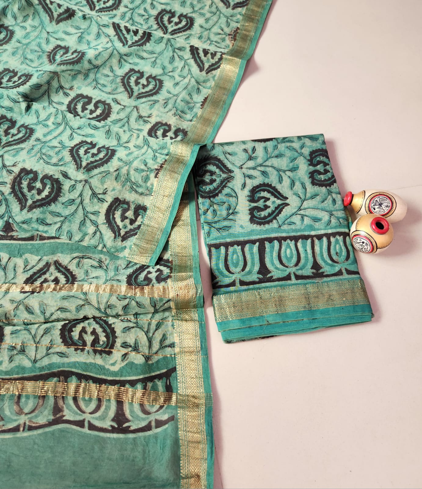 Maheshwari silk cotton suite in light green with cream vanaspati prints