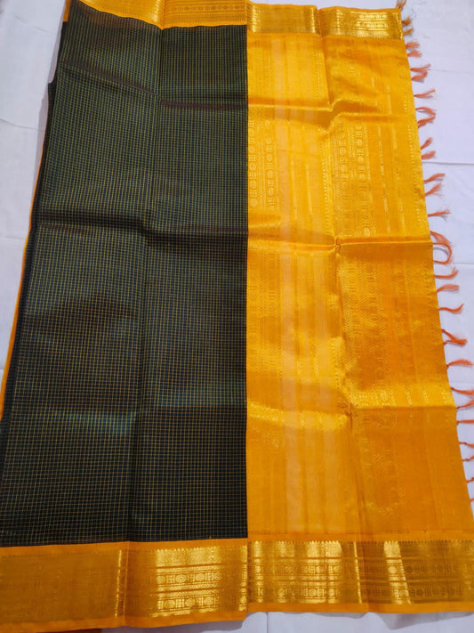 Handloom pure kanjivaram silk cotton saree dark green colour pure silver jari all over small check