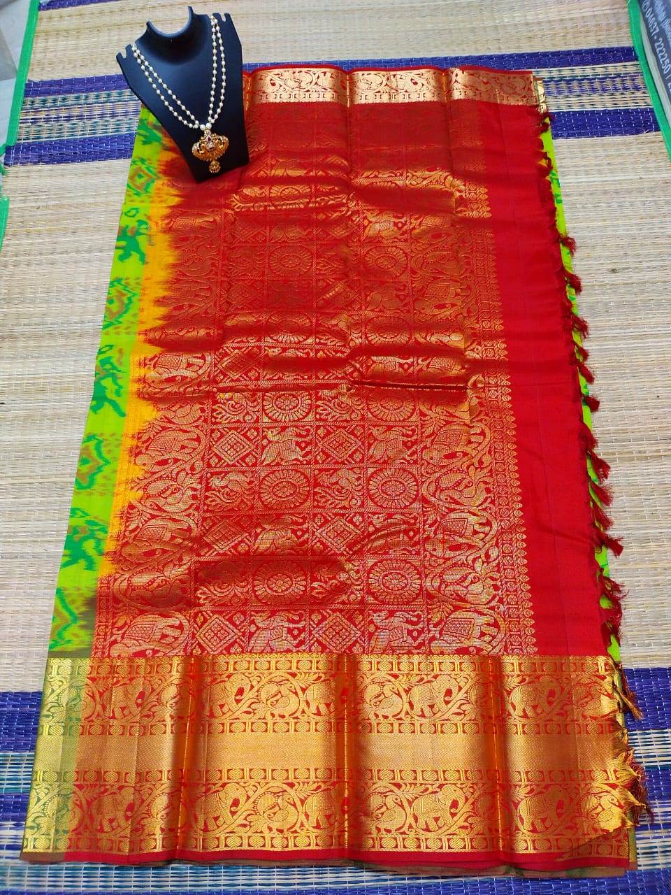 Kanjivaram softsilk saree in Ikkat green with maroon pochampalli double warp with golden jari