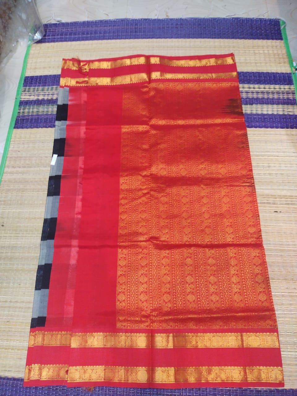 Pure silk cotton Saree with checked pattern in black and red korvai