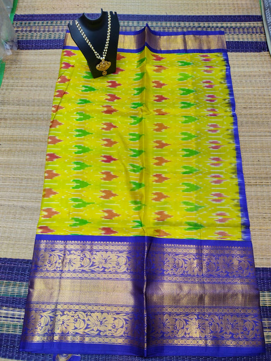 Kanjivaram softsilk saree in  yellow pochampalli double warp with silver jari