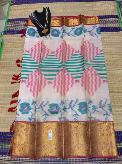 Kanjivaram softsilk saree in Ikkat cream with maroon pochampalli double warp with golden jari