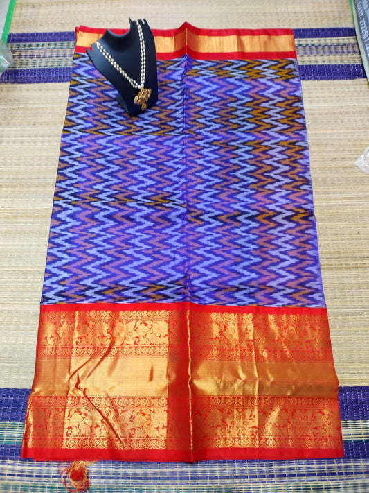 Kanjivaram softsilk saree in Ikkat purple with maroon pochampalli double warp with silver jari