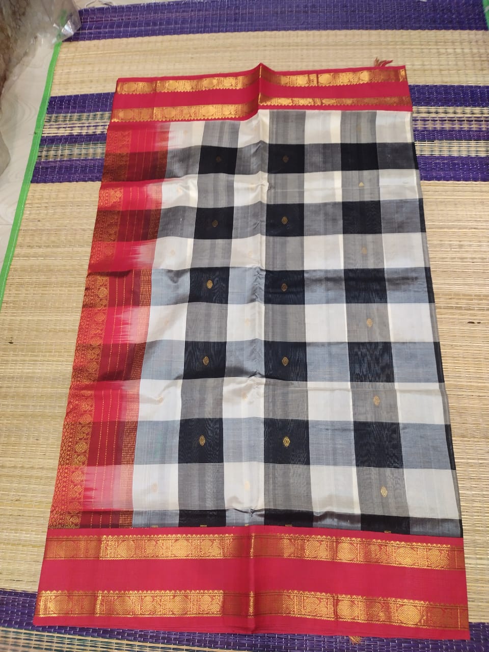 Pure silk cotton Saree with checked pattern in black and red korvai