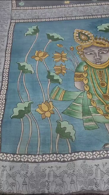 Tussar silk hand painted Kalamkari in gray color with flower and Krishna theme