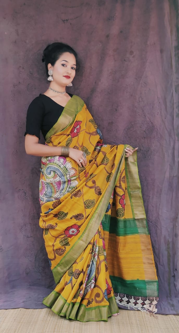 Hand painted Pen Kalamkari pure tussar Saree in peacock and forest story turmeric yellow with green colors