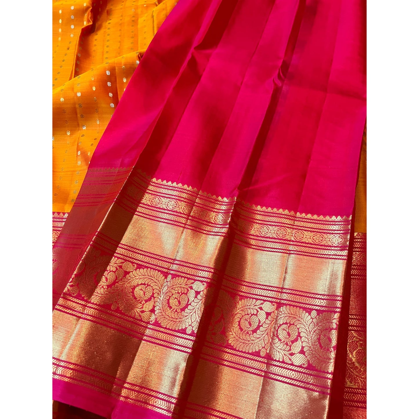 Pure Kanjeevaram border gadwal silk saree in Mango yellow body with golden butta & red color long border