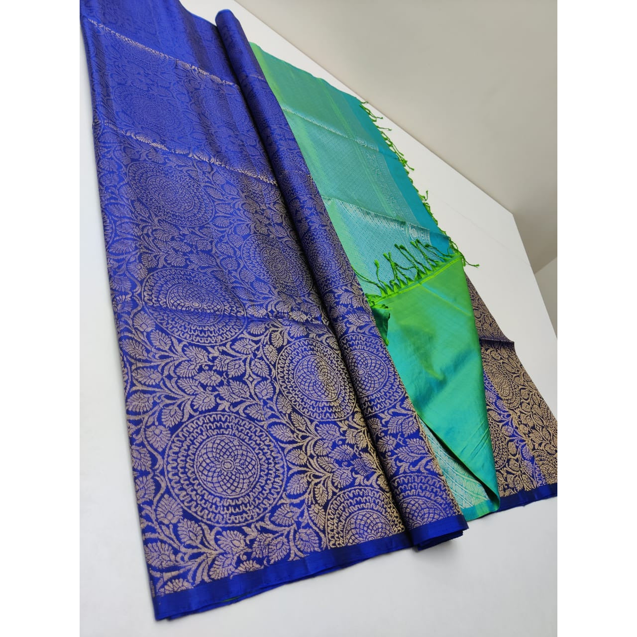 Pure handloom Double warp soft silk saree with silk mark certified. Fully woven with flower and flowers and chakras butties.