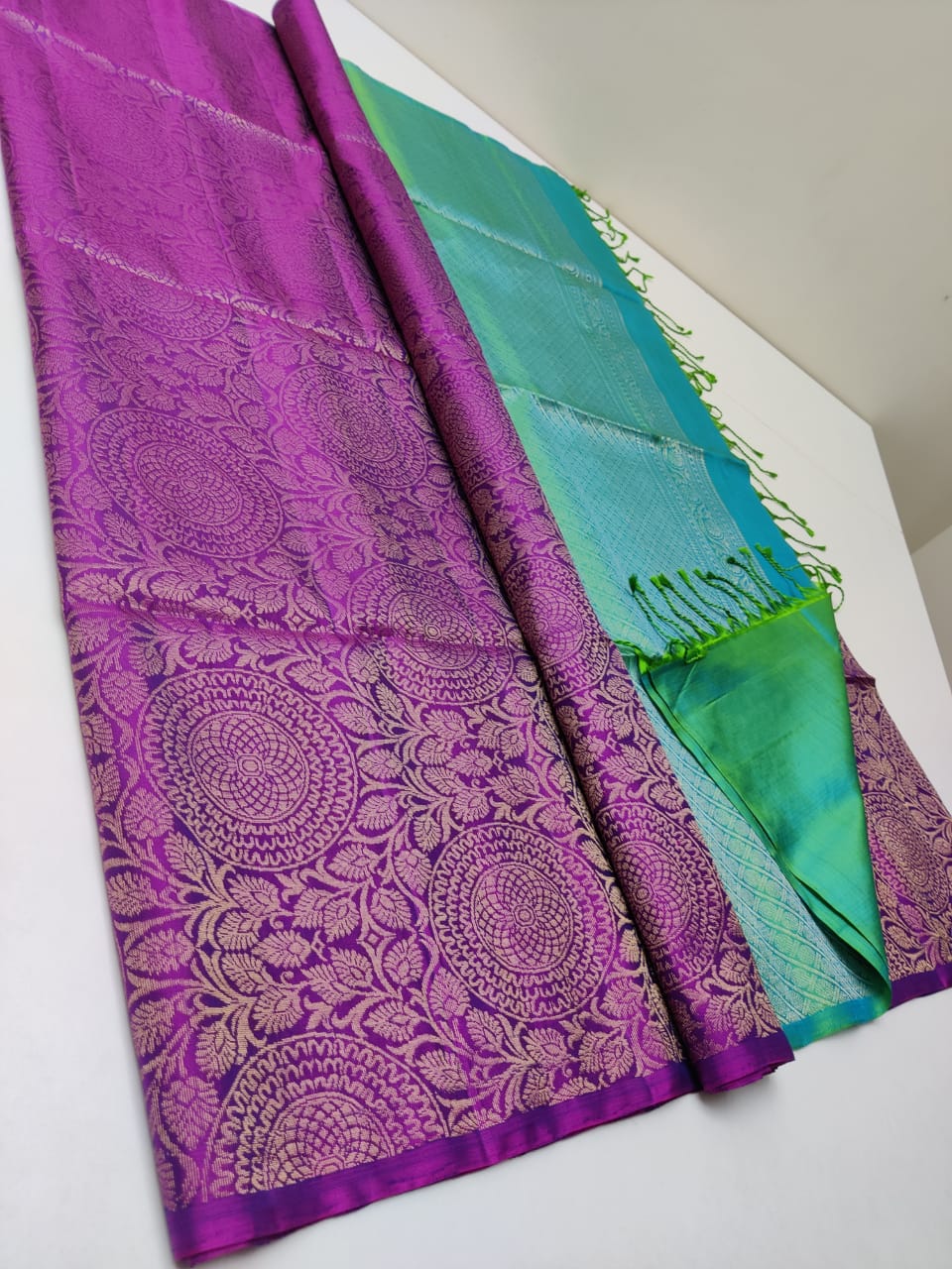 Pure handloom Double warp soft silk saree with silk mark certified. Fully woven with flower and Flowers and leaves motif with chakras in purple color