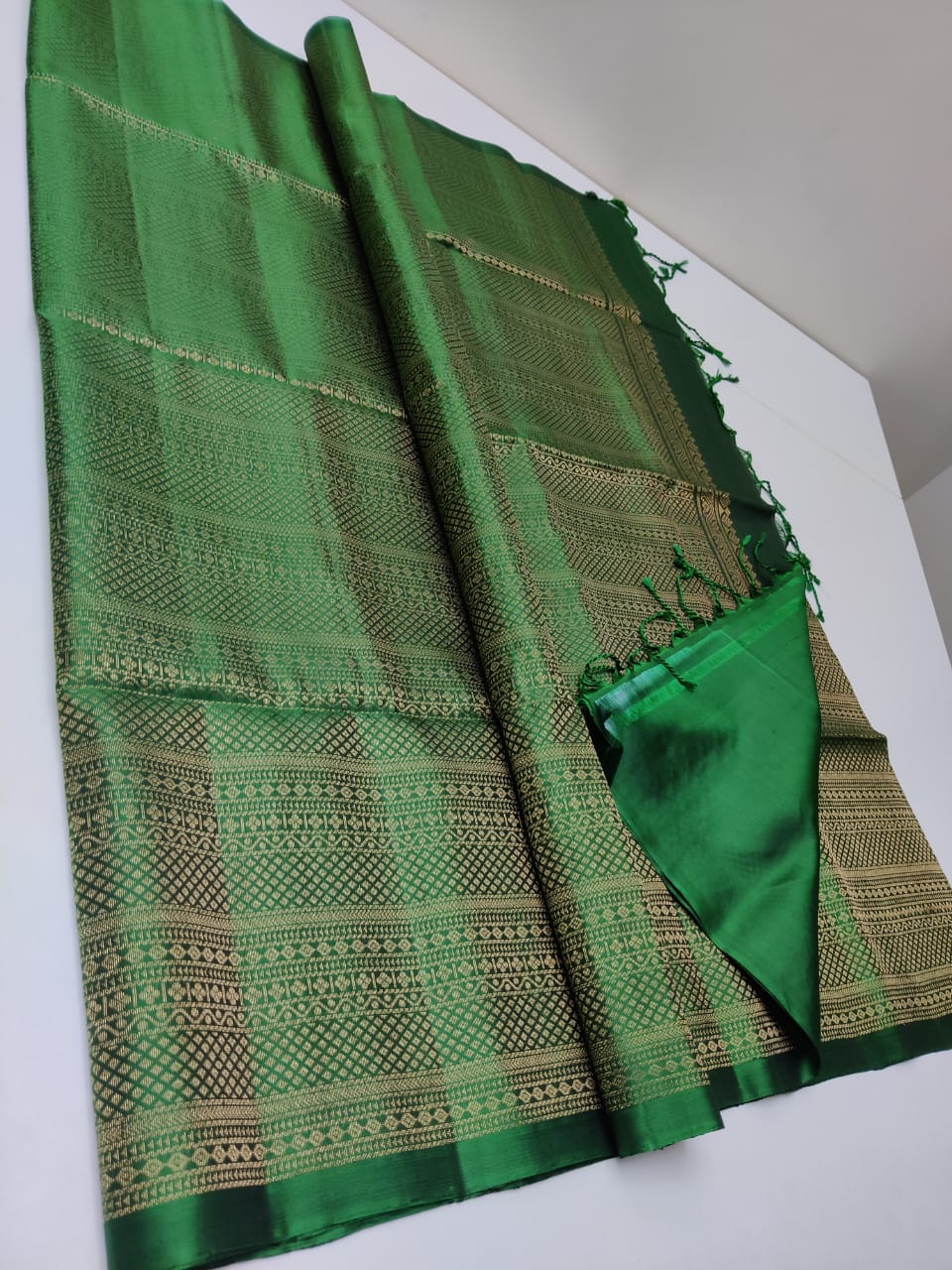 Pure Kanjivaram silk saree in green color with woven sequence