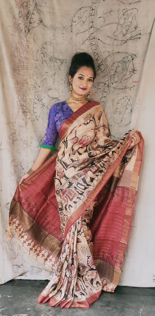 Hand painted Kalamkari pure tussar Saree in light peach color with red