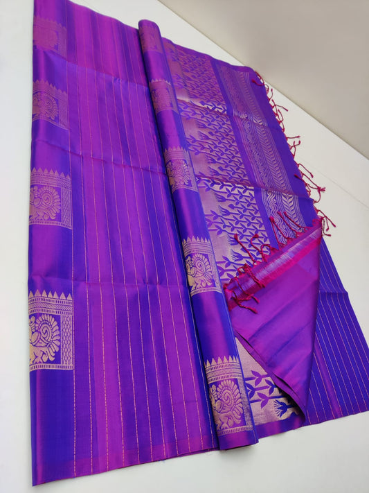 Pure Kanjivaram silk saree in purple color with woven geometric sequence with peacock 