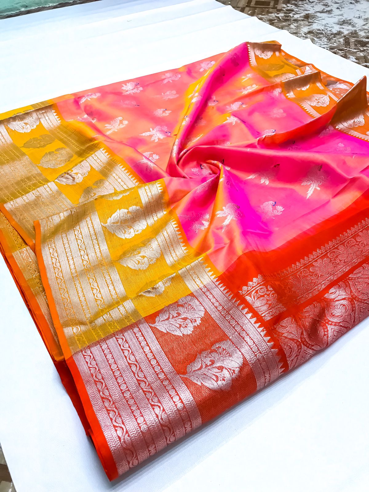 Venkatagiri handloom silk Saree in orange with yellow mix shades with peacock motives color