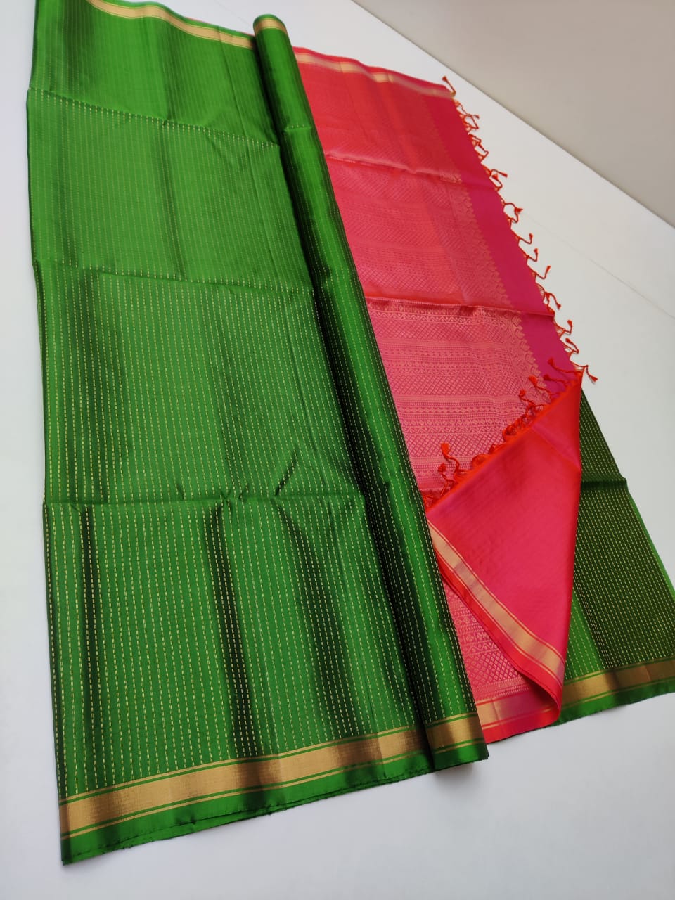 Pure Kanjivaram silk saree in green color with red with woven sequence