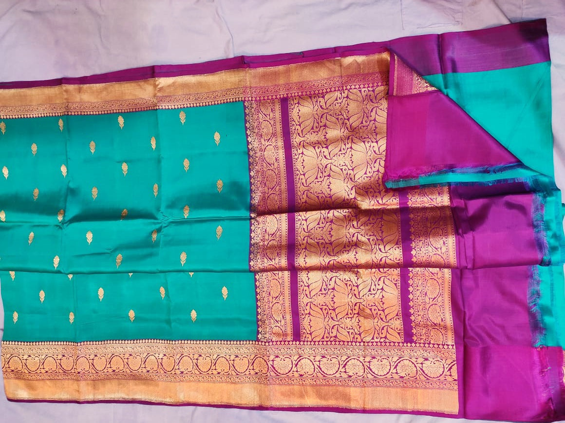 Pure Katan Banarasi in rama blue with violet Color  Saree