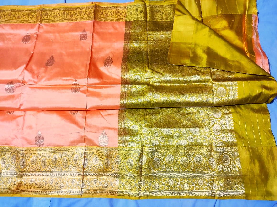 Pure katan Banarasi in with light peach with Olive Color Saree