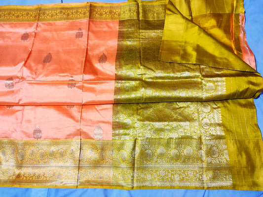 Pure katan Banarasi in with light peach with Olive Color Saree