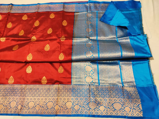 Pure Katan Banarasi in deep maroon body with peacock blue Color Saree