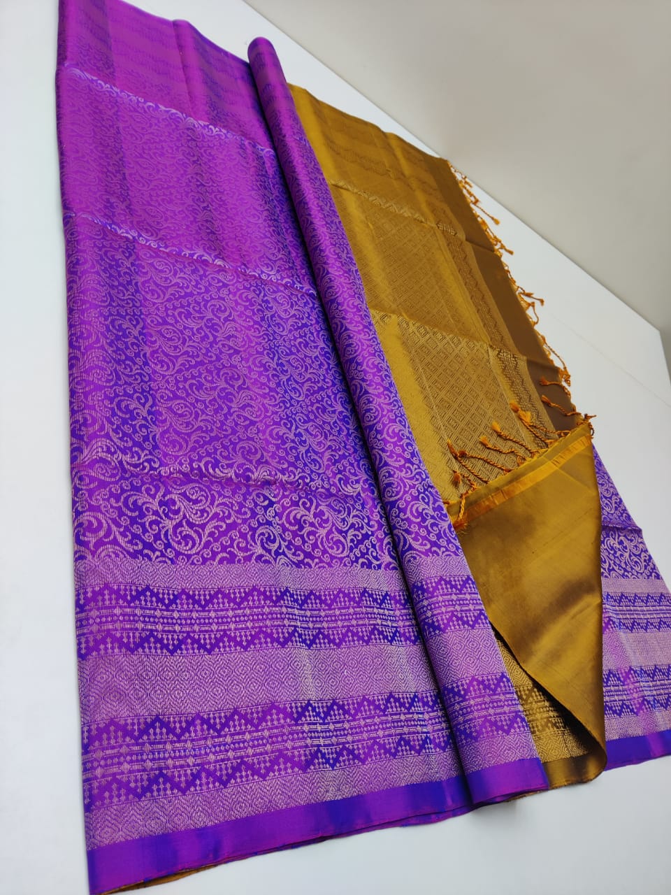 Pure Kanjivaram silk saree in handoven fully Jari weaving  in purple color with golden pallu