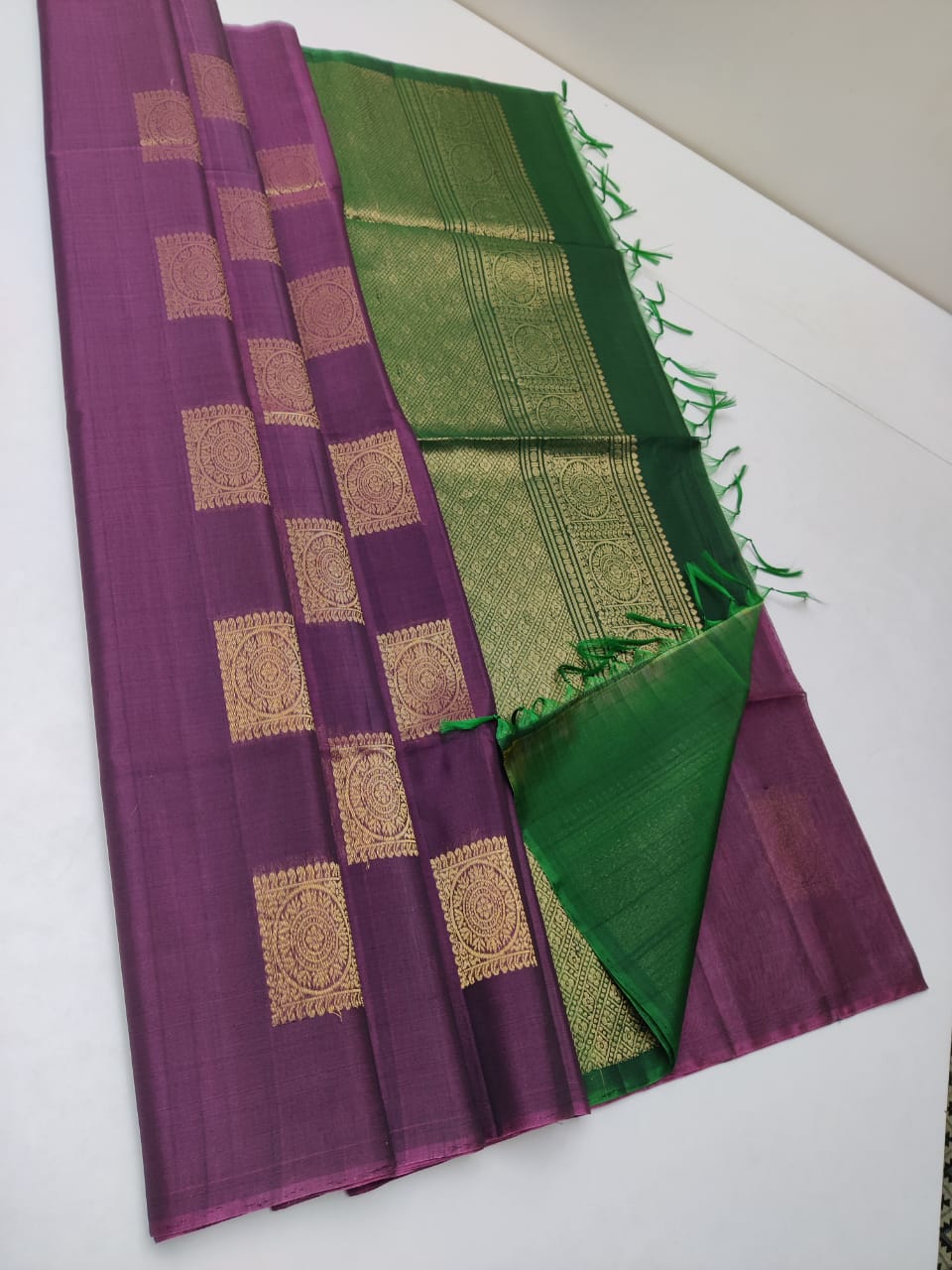 Cotton silk pure borderless in purple body color with golden butti