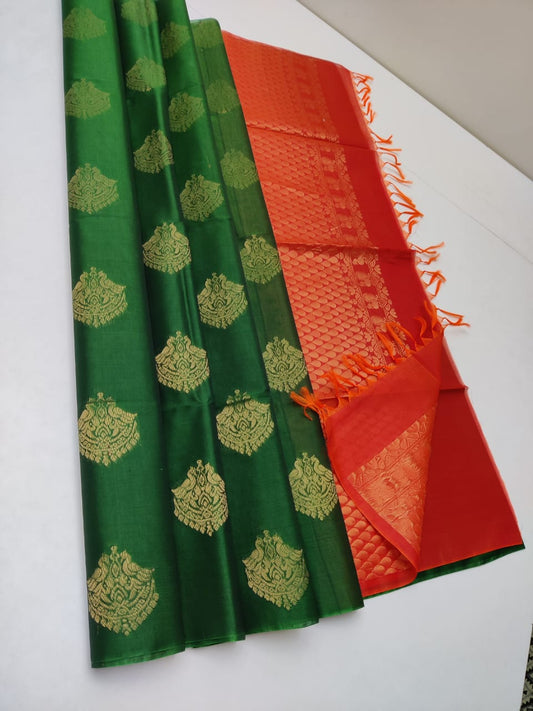 Cotton silk pure borderless in green body color with golden butti