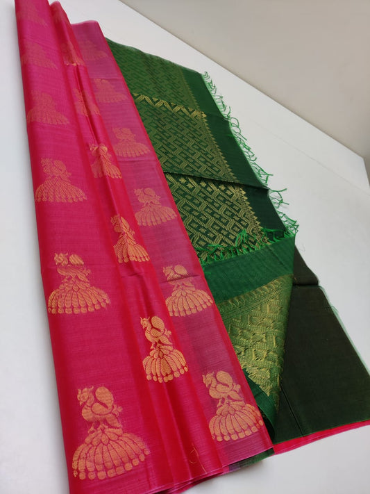 Cotton silk pure borderless in pink with green body color with golden butti