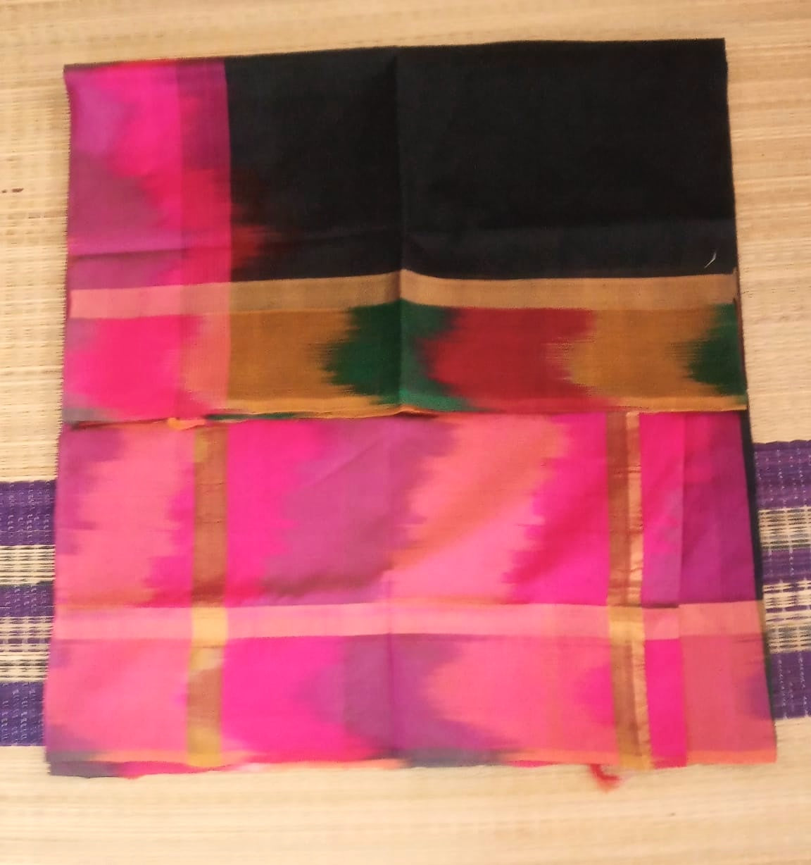 Silk cotton handloom Saree in black with pink ikkat border