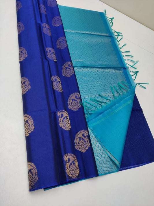 Cotton silk pure borderless in blue color with golden butti and dark Blue mundi