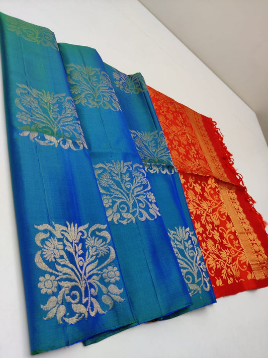 kanjivaram silk saree with double warp in borderless peacock blue