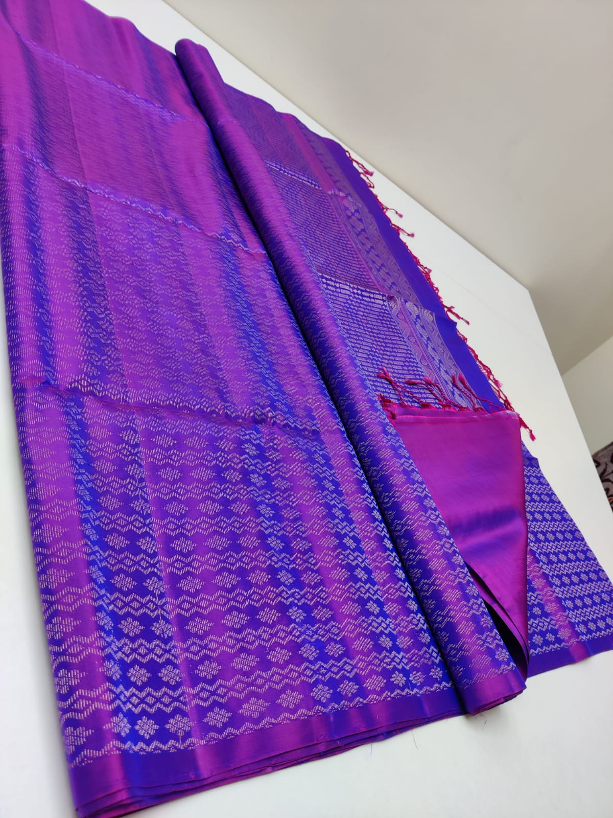 kanjivaram silk saree with double warp in borderless red border weaving in purple color