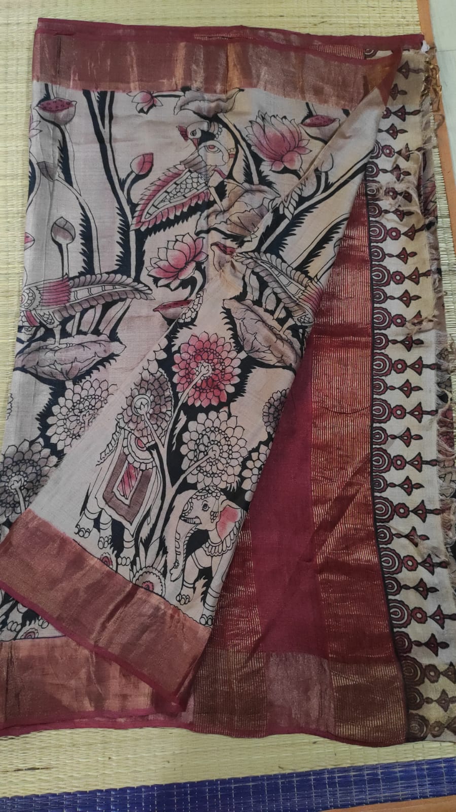 Hand painted Kalamkari pure tussar Saree in light peach color with red real blowse