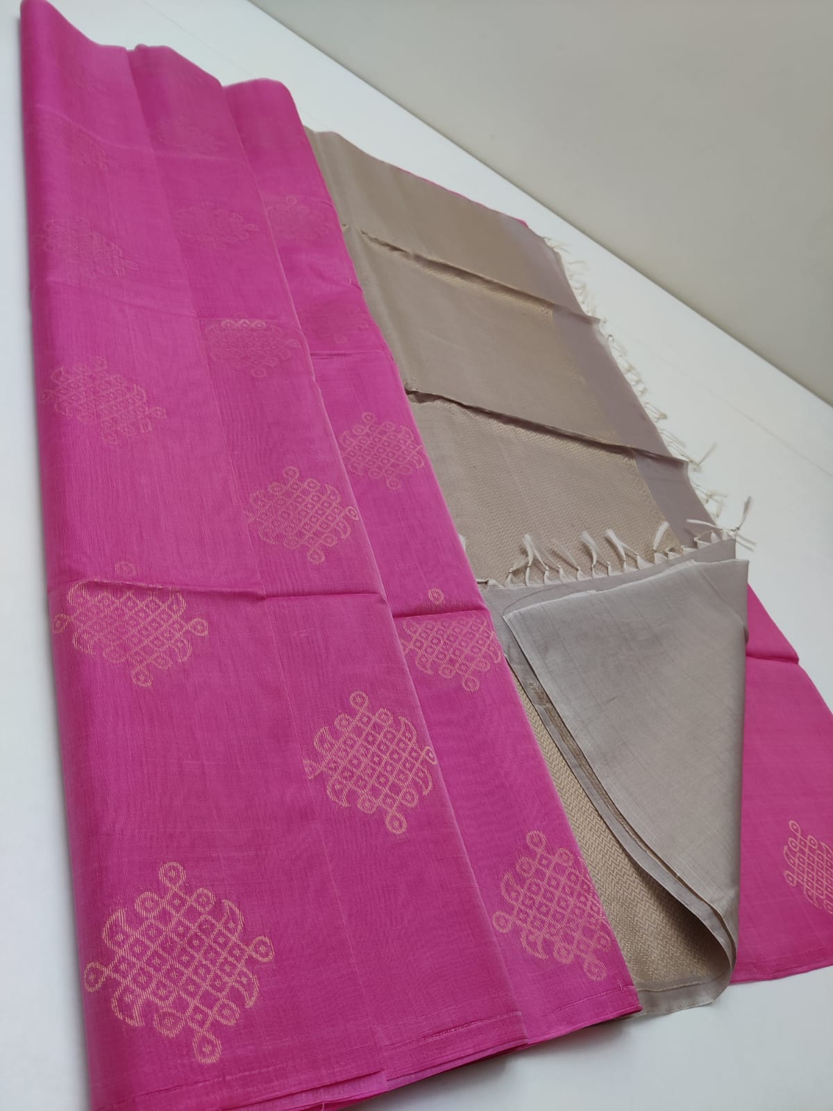 Cotton silk pure borderless in pink color with golden butti and mustard gray mundi