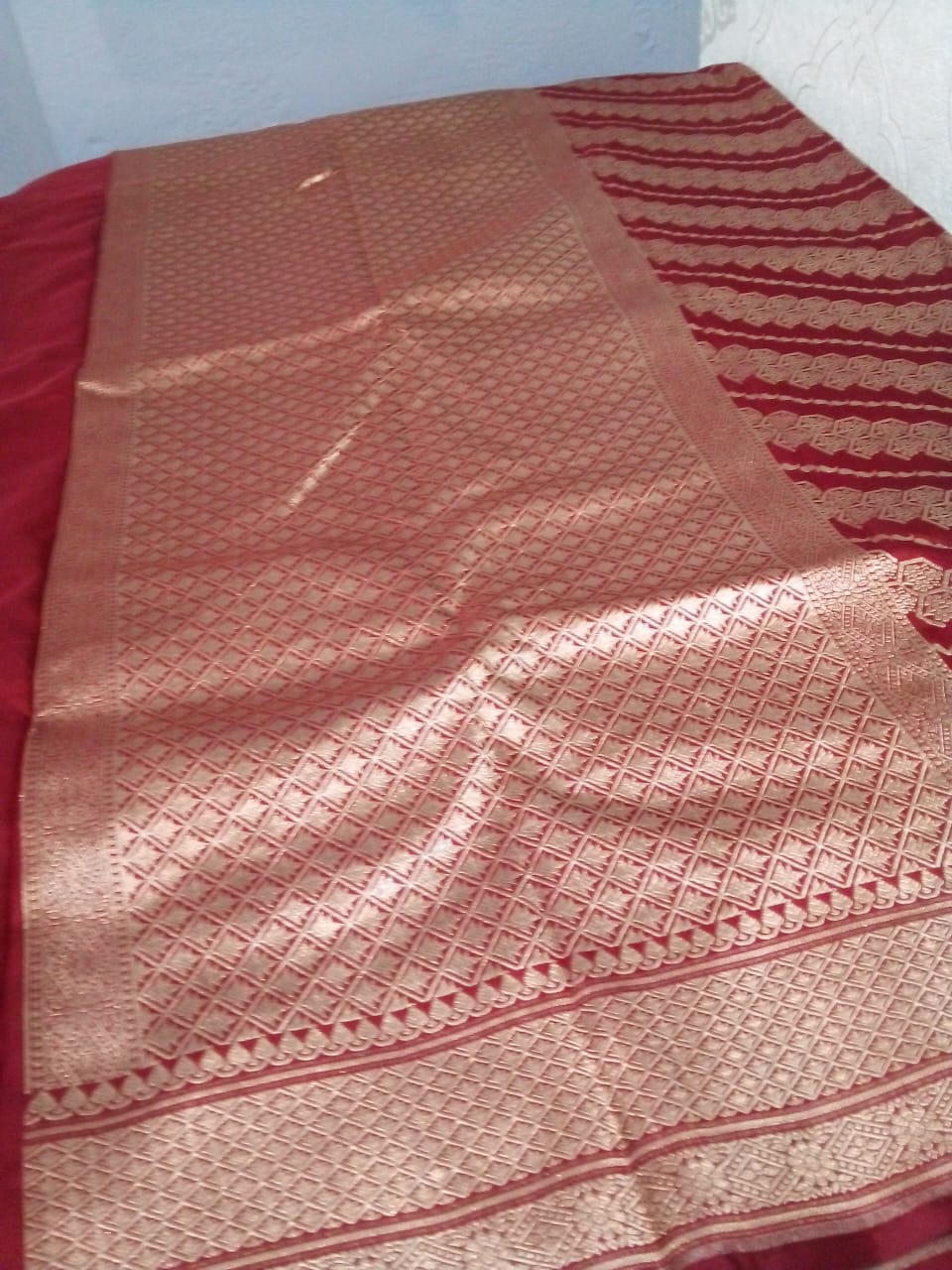 Katan by katan Banarasi full body weaving legaria pattern saree in deep bridal red color