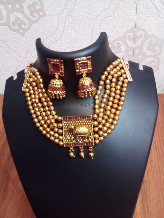 Jewellery golden pearl beads traditional necklace antique finish with elephant pendant with earrings