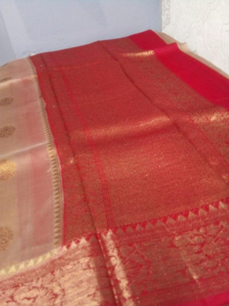 Kora Banarasi saree in kaduva butta handoven in biscuit with red