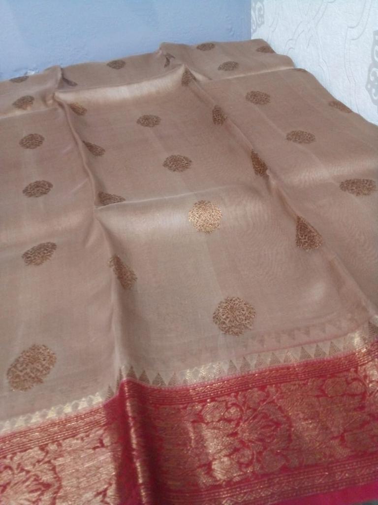 Kora Banarasi saree in kaduva butta handoven in biscuit with red