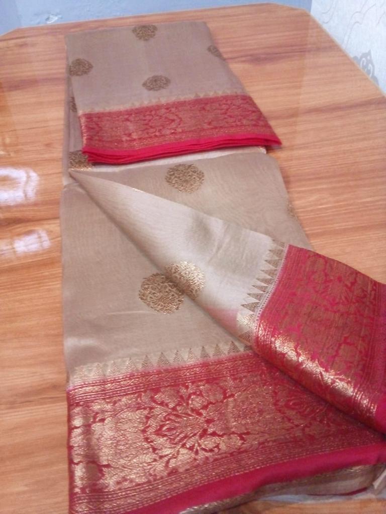 Kora Banarasi saree in kaduva butta handoven in biscuit with red